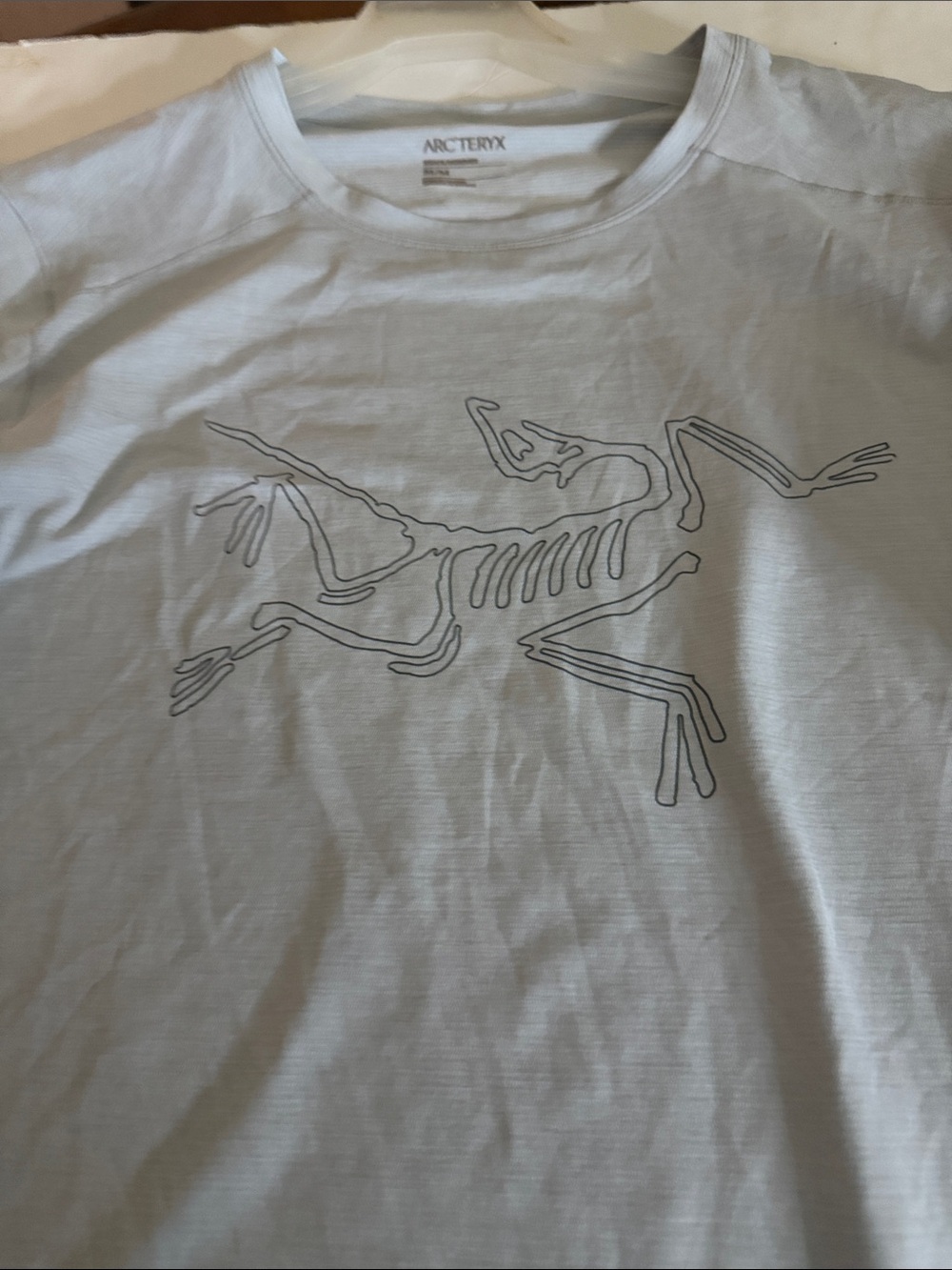 Arc'teryx Light Blue Short Sleeve Tee with Outline Skeleton Graphic - Picture 9 of 9